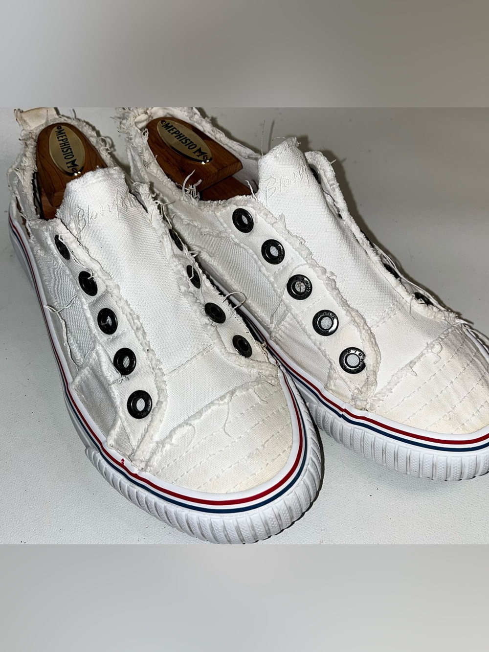 Blowfish White Canvas Slip-On Sneakers with Black Eyelets and Red/Blue Trim